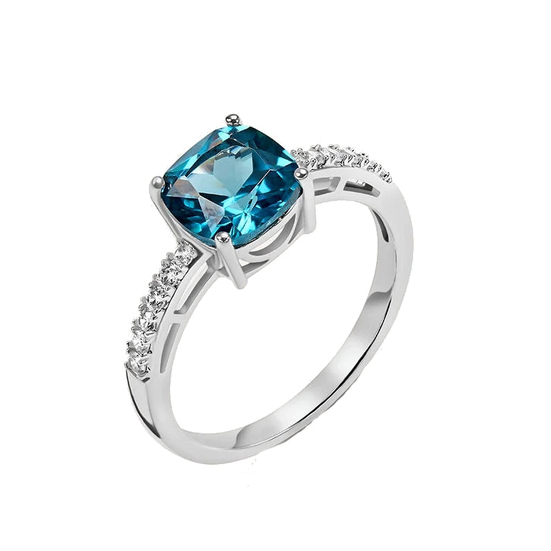 Radiant Blue Topaz and Diamond Elegance Ring