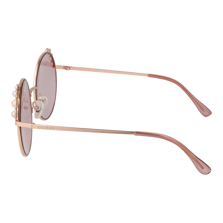 Rose gold metal round sunglasses with pink gradient lenses and pearl accents on top corners