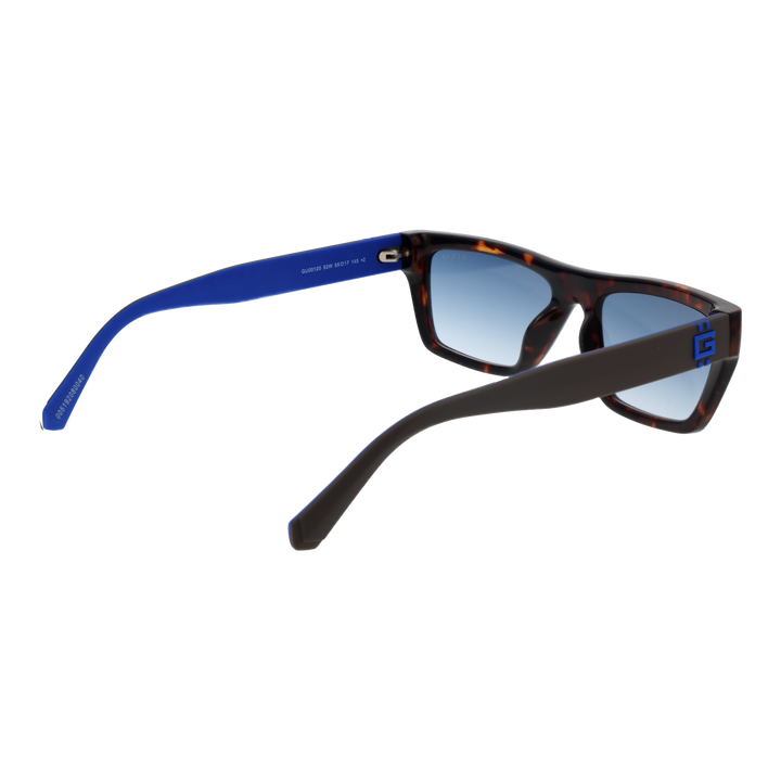 Tortoiseshell rectangular sunglasses with blue gradient lenses and Guess logo on temple and lens