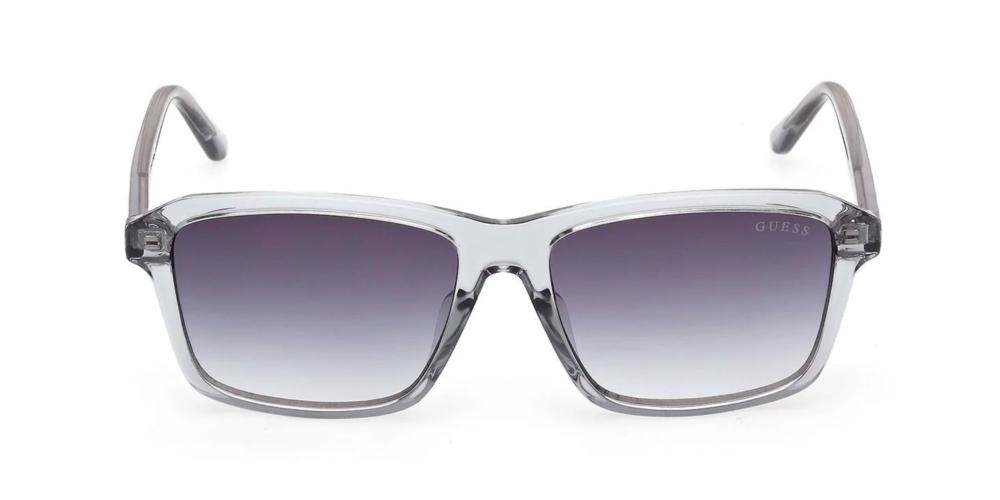 Unisex transparent gray rectangular sunglasses with gradient purple lenses on white background