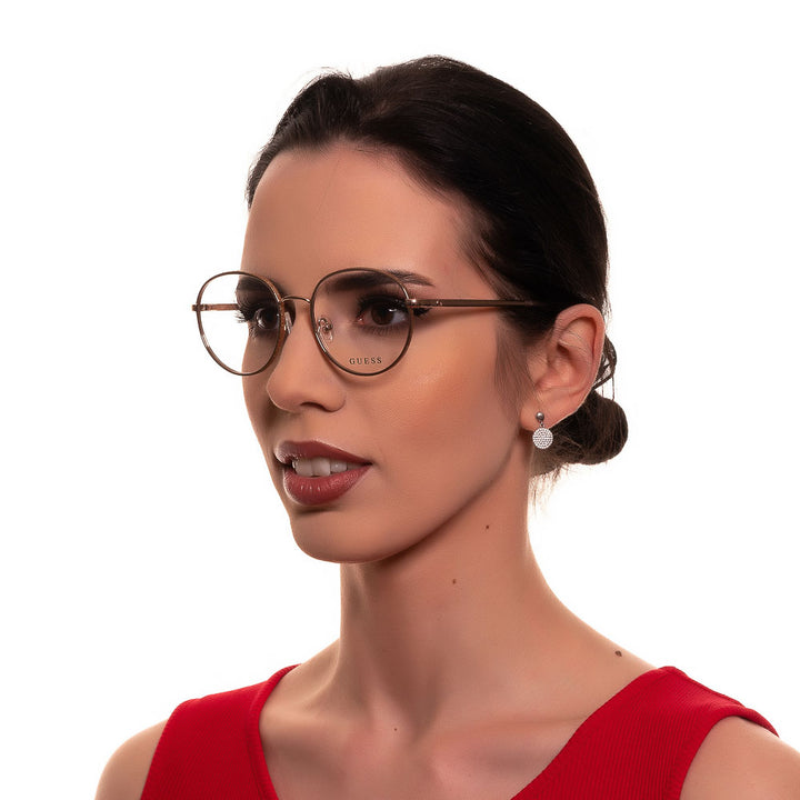 Rose gold thin metal round eyeglasses with nose pads on neutral background, classic style for Women