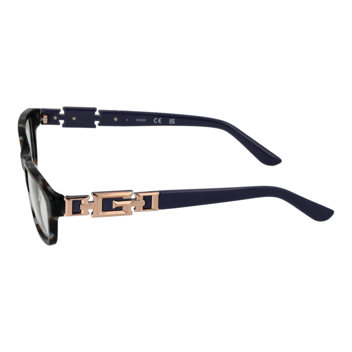 Tortoise shell rectangular eyeglasses with dark blue arms and rose-gold chain-link temple accents