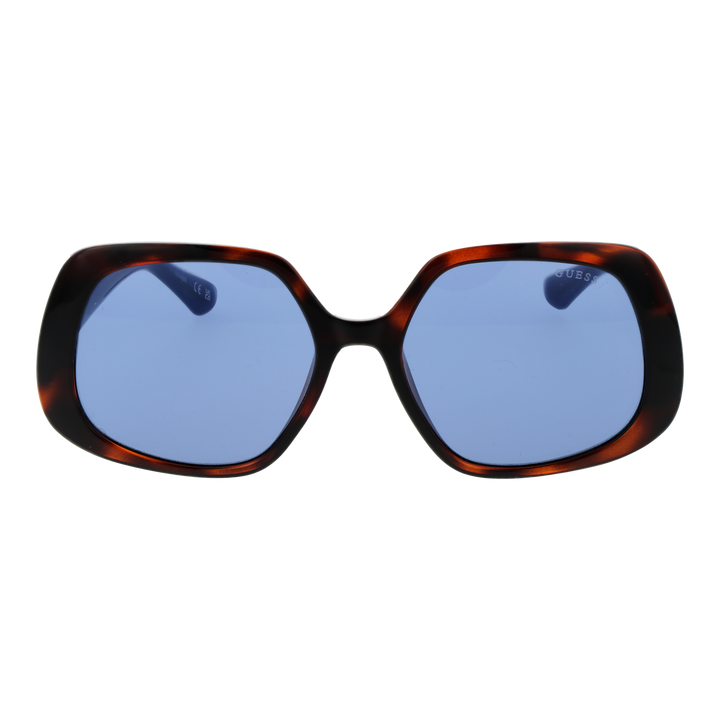 Tortoise shell oversized square sunglasses with blue-tinted lenses and logo temple detail on white background