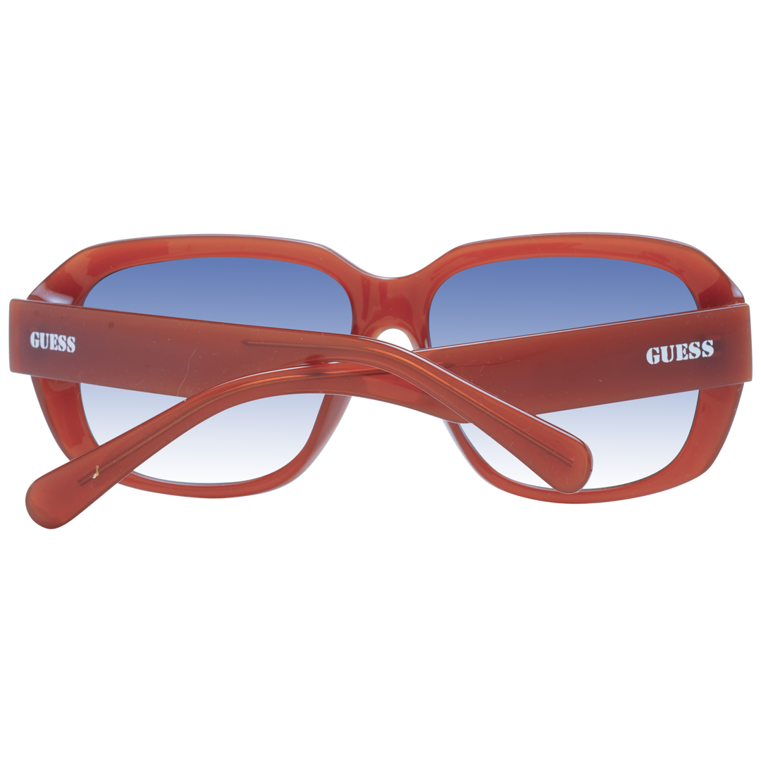 Brown plastic square sunglasses with blue gradient lenses and visible Guess logo on temple and lens