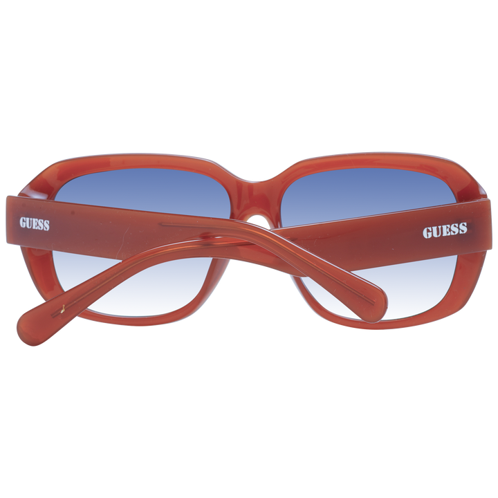 Brown plastic square sunglasses with blue gradient lenses and visible Guess logo on temple and lens
