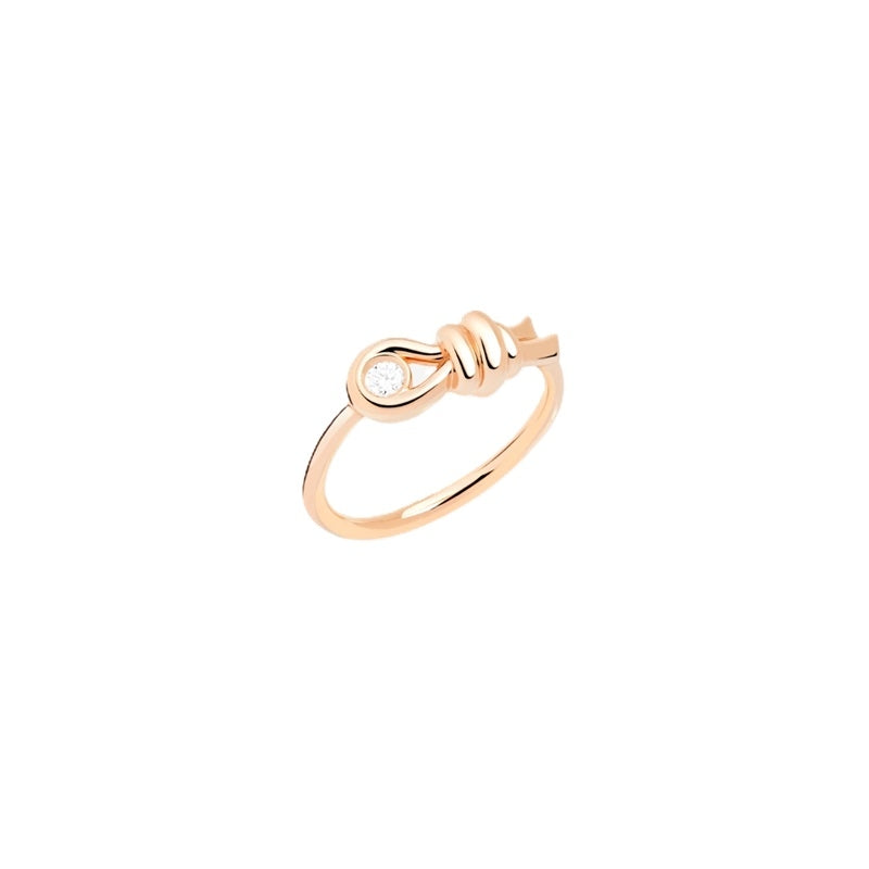 Rose gold knot ring featuring single bezel-set diamond on polished band for Women