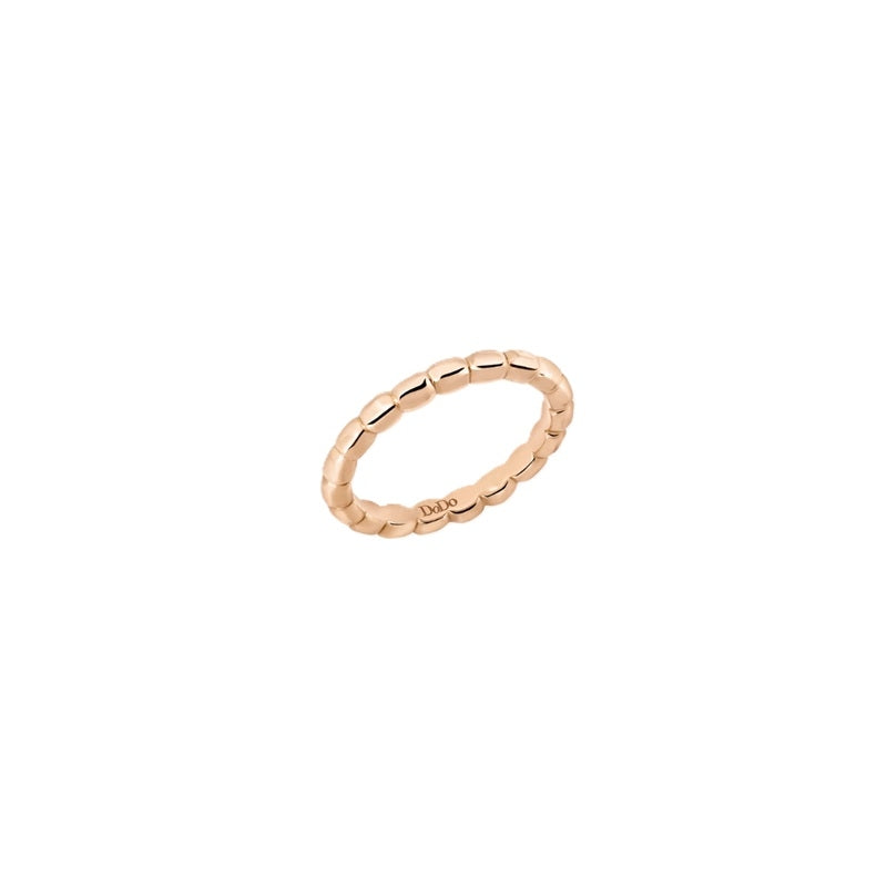 Slim 18K rose gold stacking ring on white background, minimalist rounded band for Women