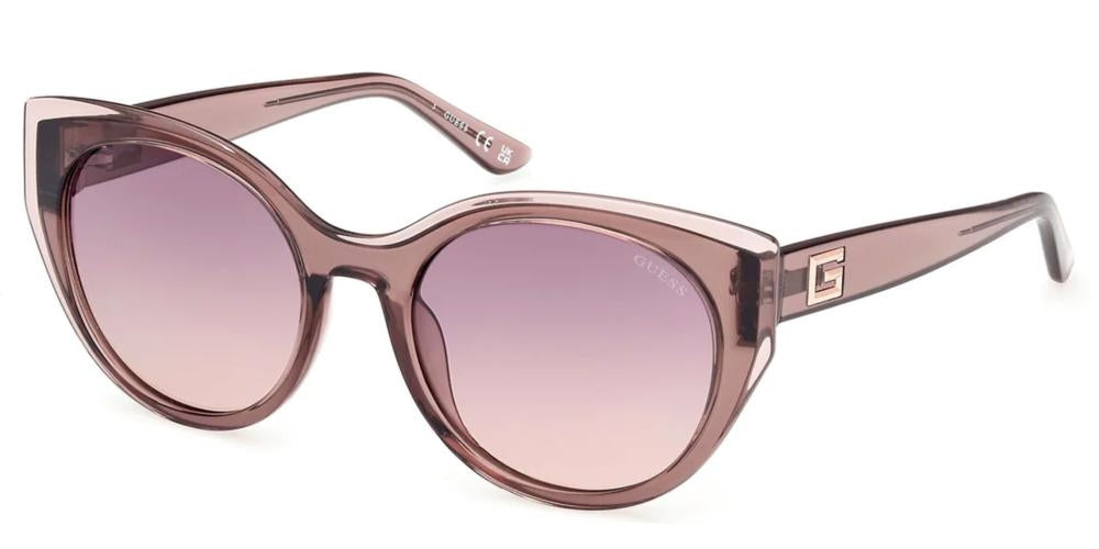 Pinkish purple retro cat-eye sunglasses on white background with gradient lenses and &
