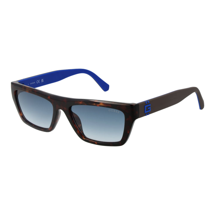 Tortoiseshell rectangular sunglasses with blue gradient lenses and Guess logo on temple and lens
